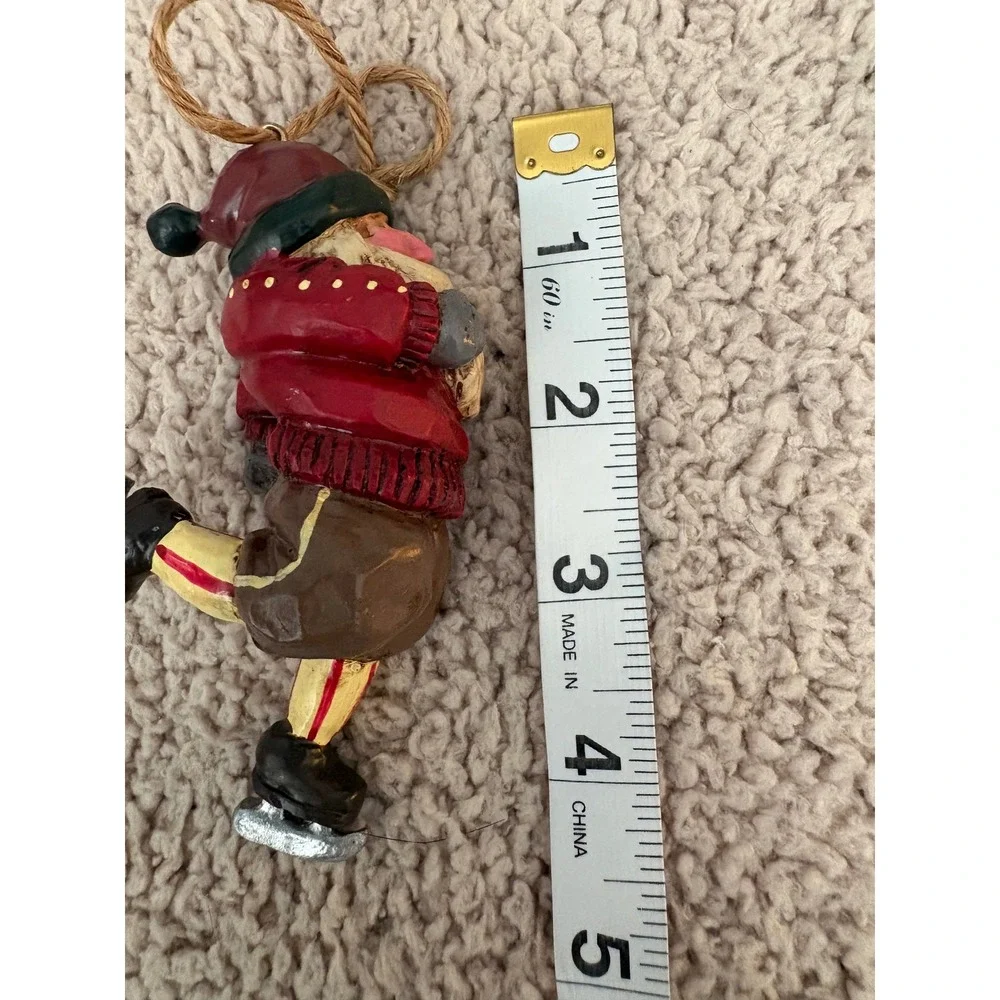 Vintage 2001 BIC Ice Skating Santa Christmas Ornament Red Sweater Folk Art